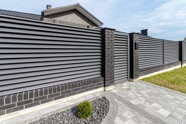 istock Fragment of a modern fence lined with decorative bricks in the old style 1485670773