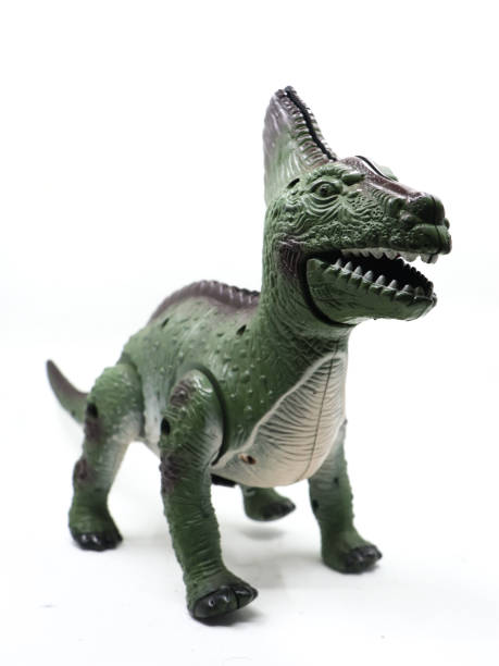 istock a green scary dinosaur mechanical toy 1485671721