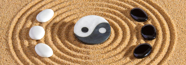 istock Japanese zen garden with stone in textured sand 1485673844