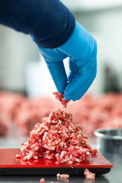 istock Grounded Beef Meat Weighing on a Scale in a Large Restaurant 1485674323