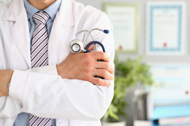 istock Young and confident male doctor with stethoscope in hands 1485674733