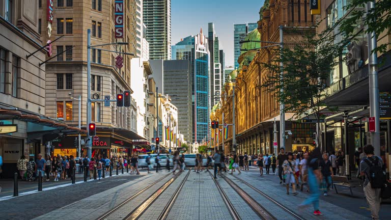 4K Footage time lapse of Crowded Commuter and Tourist walking and crossing George street though Tramway beside Queen Victoria Building in Sydney