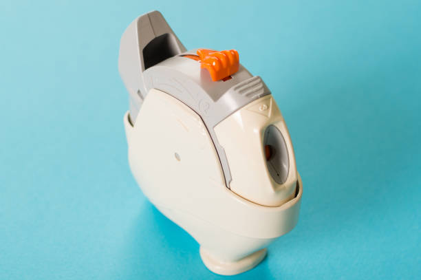 istock Pharmaceutical products for using to treat or prevent an asthma attacks. Inhaler on the blue background. 1485677787