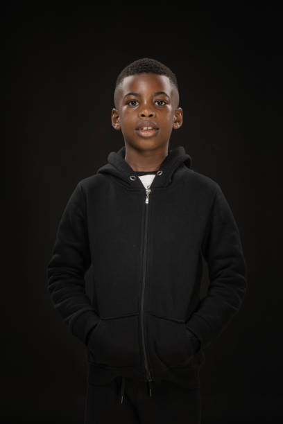 istock Beautiful young black boy posing for studio portrait 1485678366