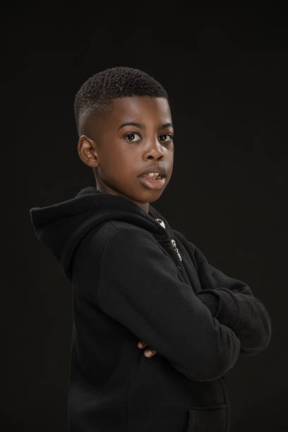 istock Beautiful young black boy posing for studio portrait 1485678367