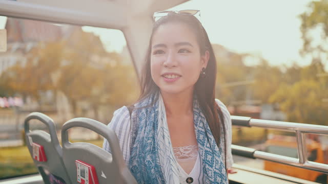 Asian woman tourist on the bus