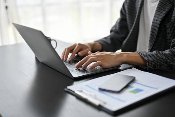istock Close up view of businessman typing on laptop computer 1485683711