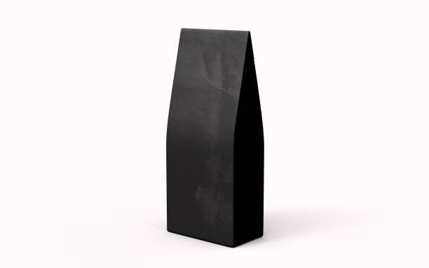 istock Tea or coffee black paper packaging bag isolated on white background. 3d rendering. 1485686987