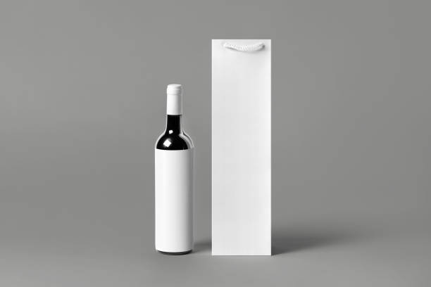 istock Blank tall white wine bottle bag mockup set, isolated, 3d rendering. Empty carry handbag for wine or vodka mock up. Clear paper packaging fit for store branding. 1485689234