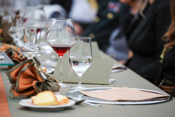 Banquet table setting Gala diner table with important guests. Food and drink establishment. Hollyday table setting. gala dinner table stock pictures, royalty-free photos & images