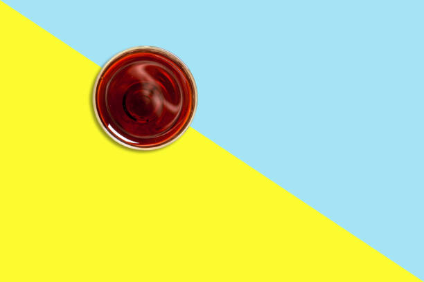 Half shot of a black tea glass