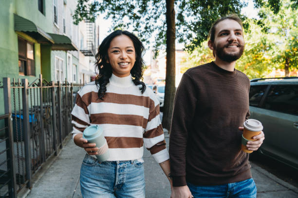 istock A millennial couple is walking together in Brooklyn 1485704069