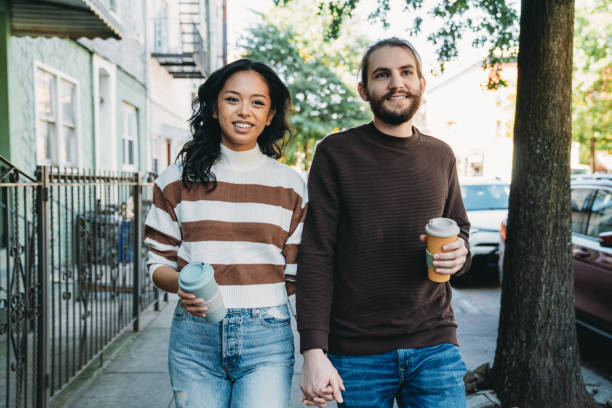 istock A millennial couple is walking together in Brooklyn 1485704071