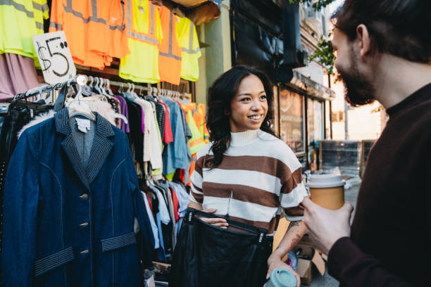 istock A millennial couple is taking a look at a second-hand clothing store 1485704080