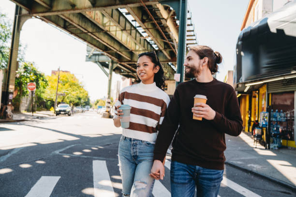 istock A millennial couple is walking together in Brooklyn 1485704086