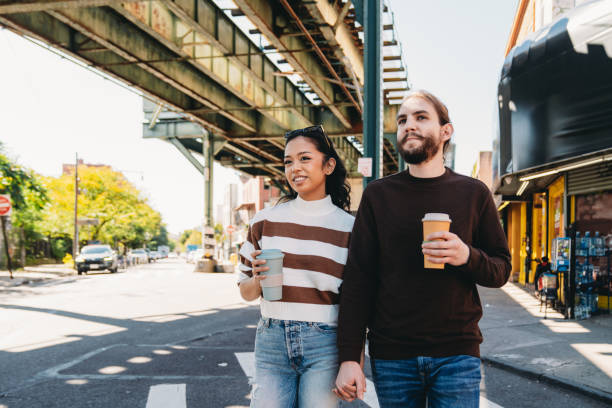 istock A millennial couple is walking together in Brooklyn 1485704088