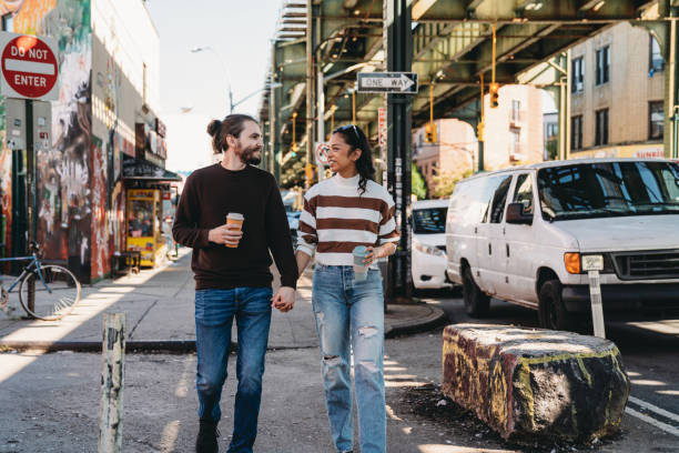 istock A millennial couple is walking together in Brooklyn 1485704095