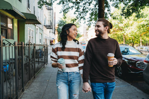 istock A millennial couple is walking together in Brooklyn 1485704110