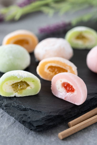 istock Japanese colorful mochi on gray stone surface 1485707015