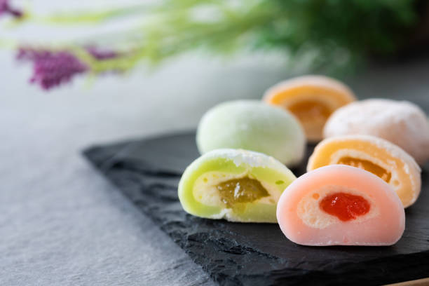 istock Japanese colorful mochi on gray stone surface 1485707087