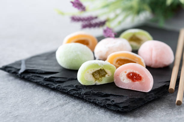 istock Japanese colorful mochi on gray stone surface 1485707114