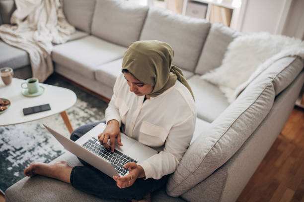 istock Modern Indian woman using laptop 1485707135