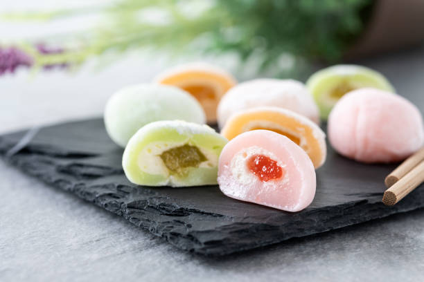istock Japanese colorful mochi on gray stone surface 1485707140