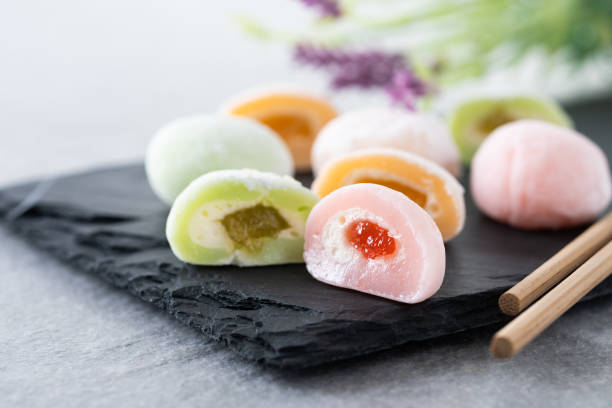 Japanese colorful mochi on gray stone surface