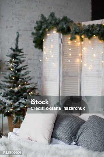 istock Loft interior bedroom with Christmas tree 1485709909