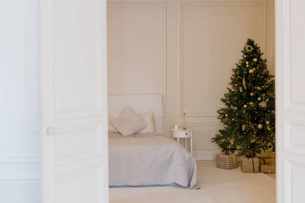 istock Light Christmas bedroom with Christmas tree 1485710503