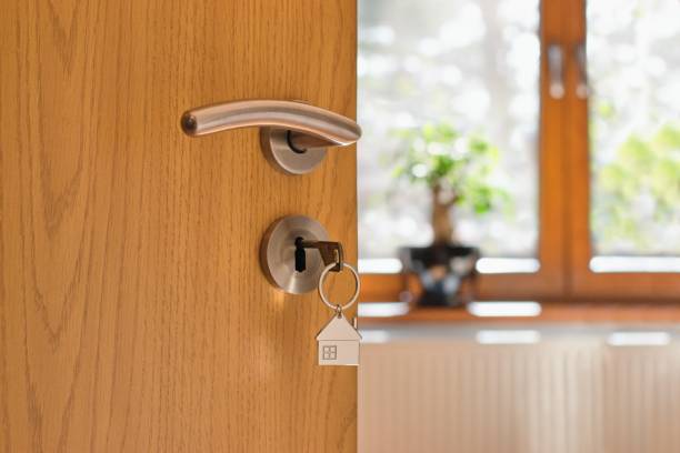 istock Half opened door into the modern cozy home interior 1485710862