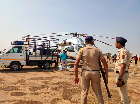Police are protecting the minister's helicopter. Pune, Maharashtra, India January, 22, 2023