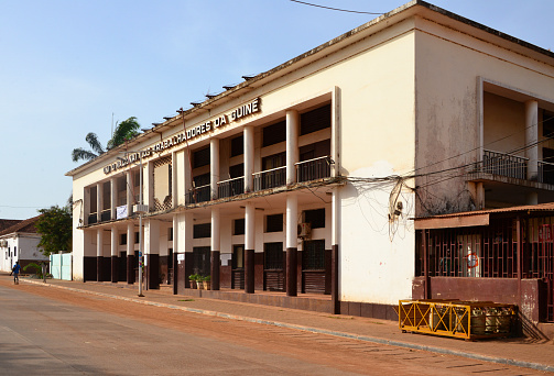 Bissau, Guinea-Bissau: façade of the National Union of Workers of Guinea building, originally the Union of Commerce and Industry ('Sindicato Nacional dos Empregados do Comércio e Indústria') - designed by Eurico Pinto Lopes, 'Estado Novo' architecture.