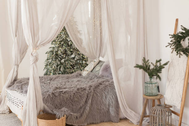 istock Christmas scandinavian bedroom with white canopy 1485712772
