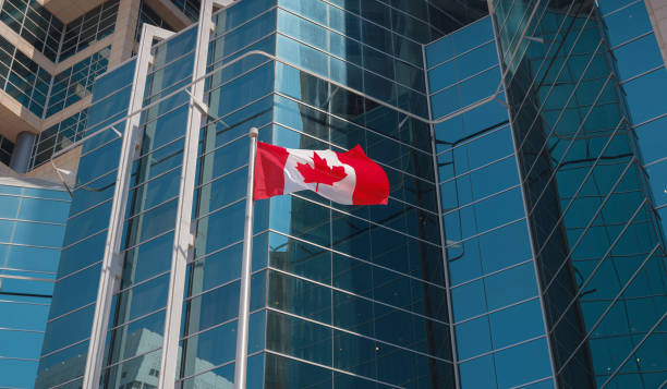istock Flag of Canada flying against a blue sky. 1485713261