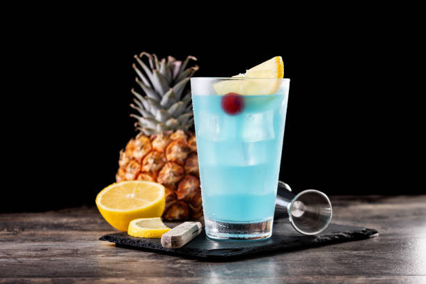 istock Deep blue sea martini cocktail on wooden table 1485716717