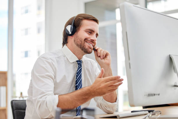 istock Callcenter, customer service or man on computer for virtual support, consulting or networking in office. Manager, CRM or sales advisor on tech for telemarketing, research or telecom contact us help 1485717187