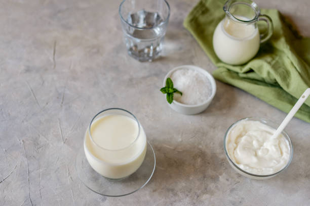 istock Ayran is a popular refreshing Middle Eastern beverage made with yogurt, water and salt. Concrete backgraund 1485717367