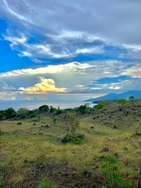 istock Tulamben Beach view from distance with cloudy sky 1485718016