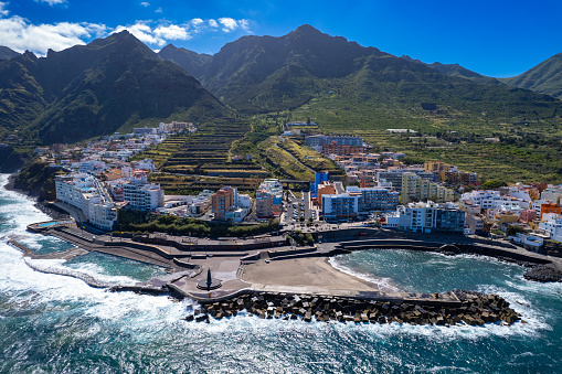 Aerial view above the seaside village of Bajamar on the Atlantic Ocean with its iconic natural pools