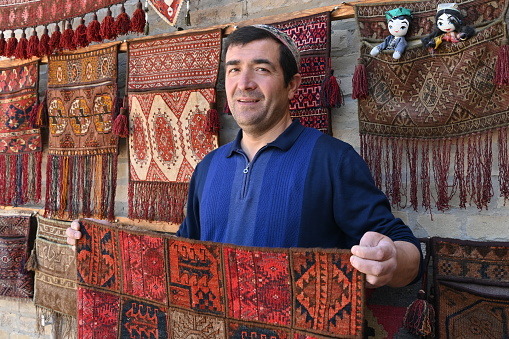 Bukhara, Uzbekistan, April 10, 2023 - Carpets are a great Uzbek souvenir. Khiva, Bukhara, Samarkand, Kokand, Shakhrisabz, and Karakalpakstan all make rugs with different techniques and designs.