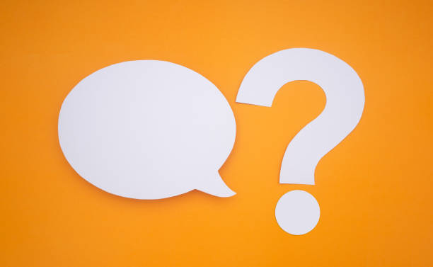 istock Speech bubble concept. An empty speech balloons and question mark symbol on a yellow background. 1485722253