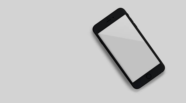 istock Mock-up new smartphone with a white screen close up top view. 1485722903