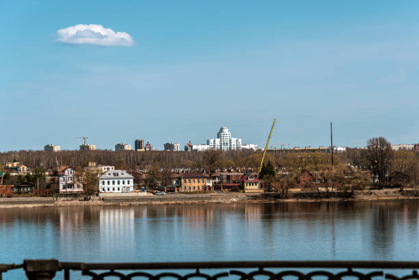 istock Cityscape with buildings on the river bank. 1485727514
