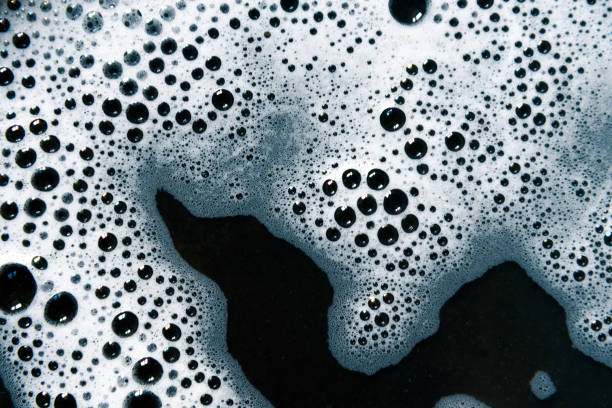 istock Foam air bubbles on black background. 1485728957