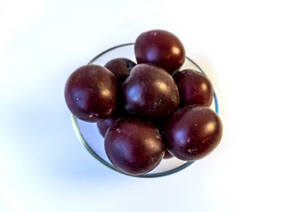 istock photo of plum on a plate, isolate 1485730061