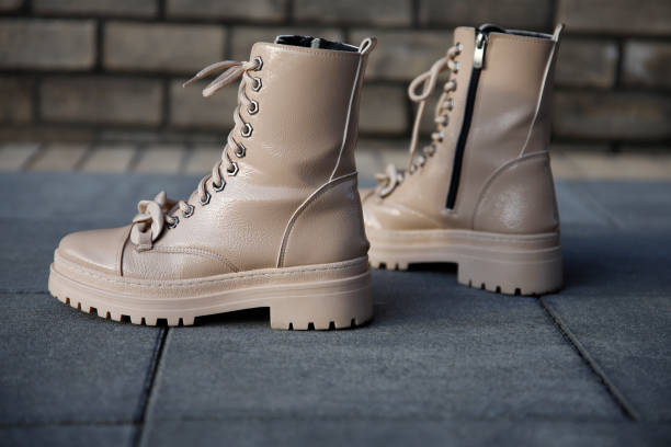istock Stylish leather boots outdoors in the street 1485733029