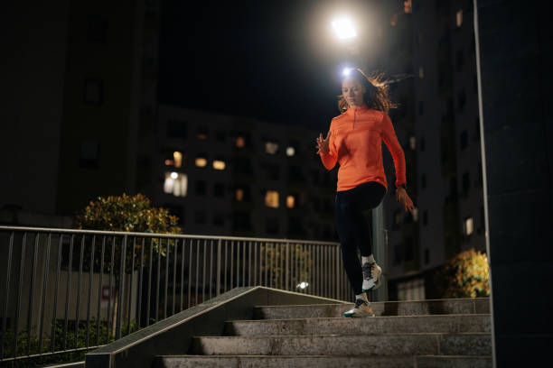istock Attractive female athlete in city. 1485736390