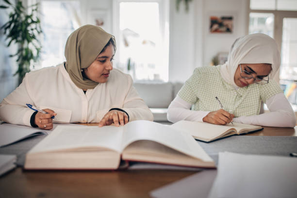 istock Two young women studying together 1485736874
