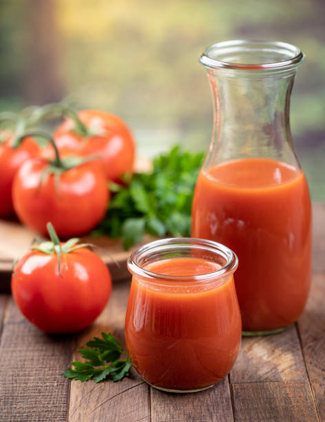 istock Tomato juice with fresh tomatoes and parsley 1485738682